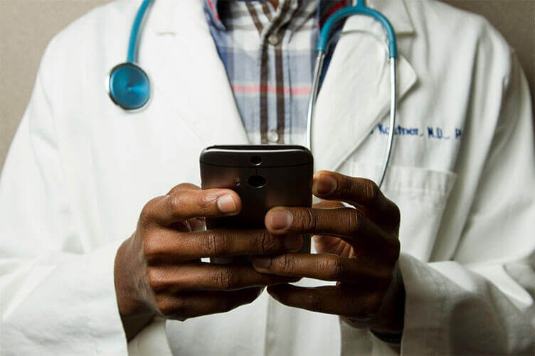 healthcare provider with mobile device