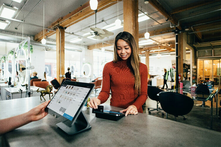 shopper making purchase transaction with loyalty card